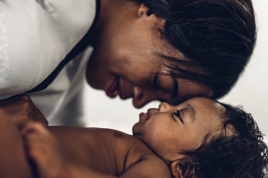 Photo of a mother with her newborn baby